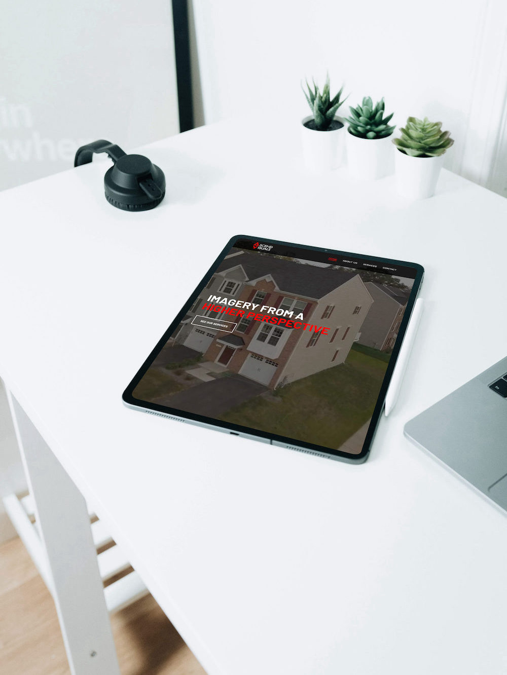 Ascend Visuals' website displayed on tablet